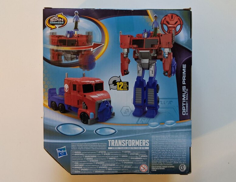 In Hand Box Image Of Transformers Earthspark Spin Changer Optimus Prime With Robby Malto  (4 of 5)